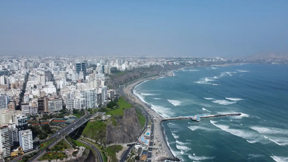 The Miraflores clifftop district of Lima above the Pacific coast road and beach.