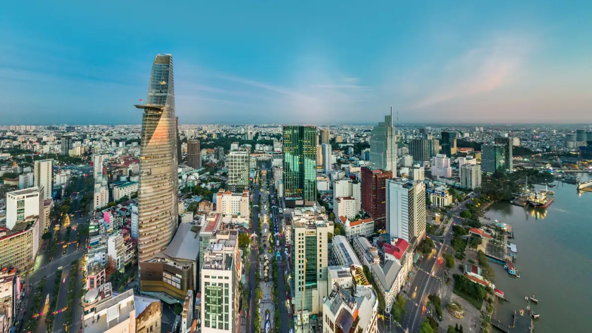 The Ho Chi Minh City skyline and the Saigon River on a clear day.